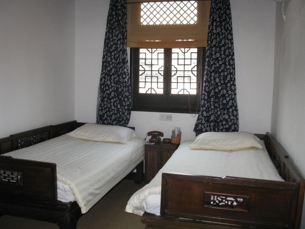 XI Di Travel Lodge Yi (Anhui) Kamer foto